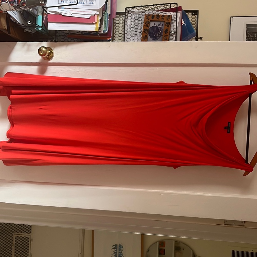 A stylish asymmetrical hem, versatile style for up or down dressing.